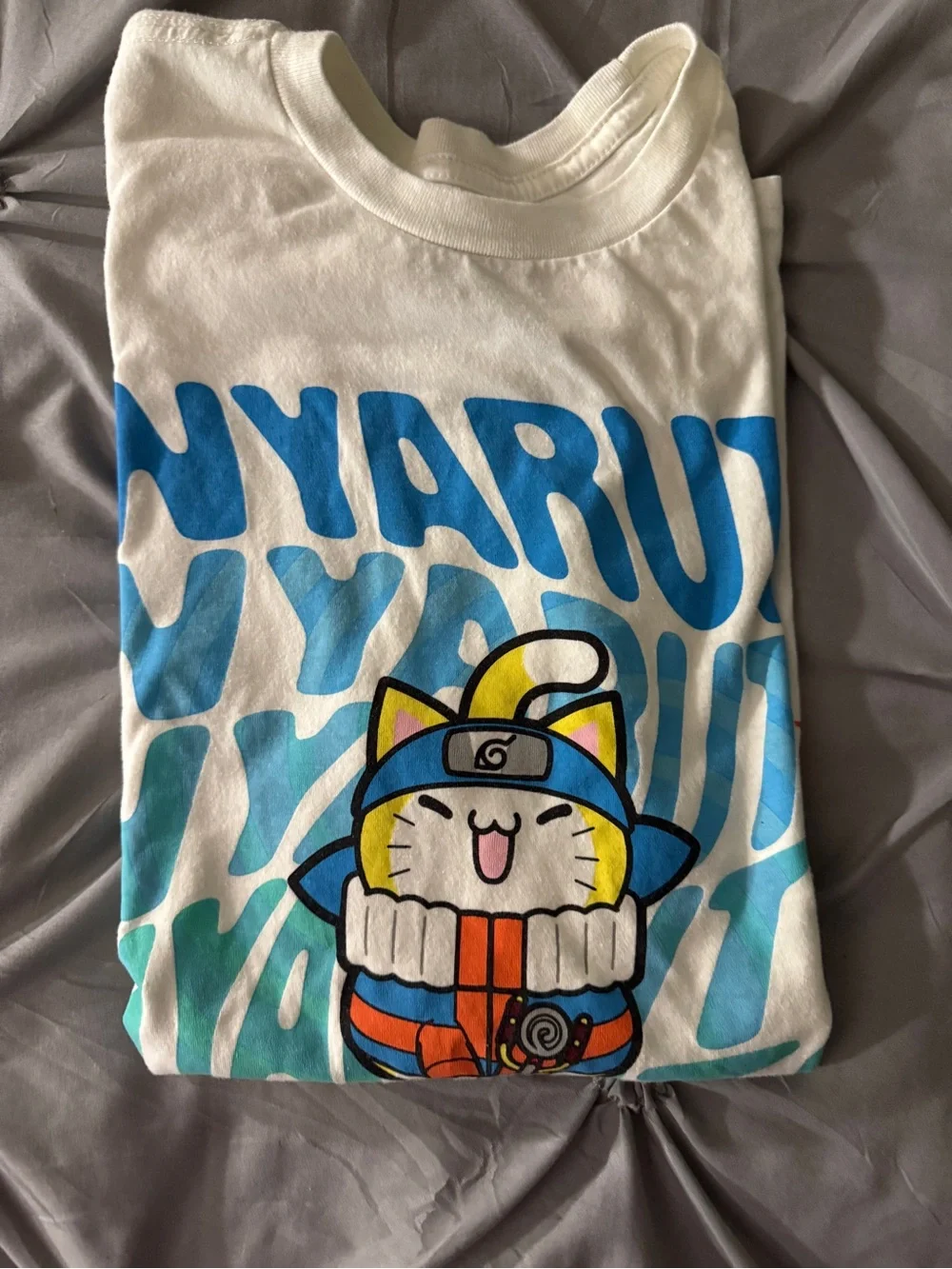 Lot of six graphic tees and one zippered Brand Spyder sweater. Size 14-16